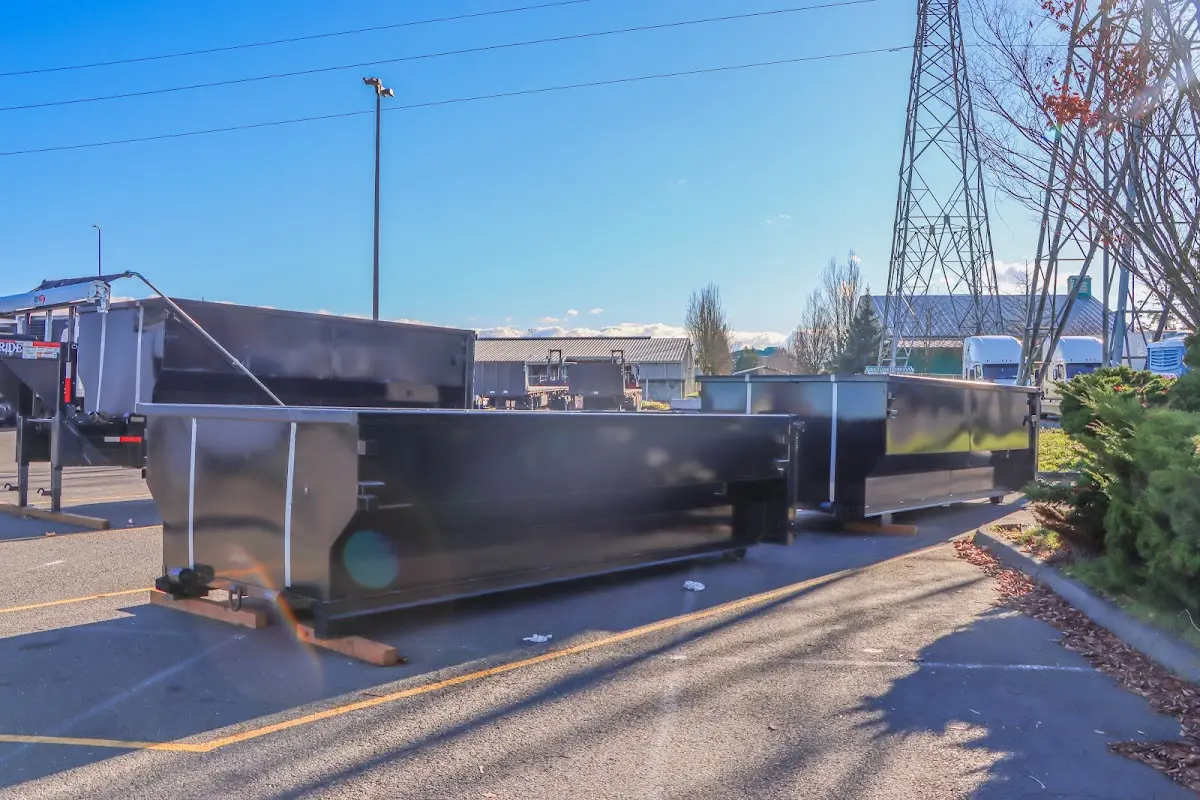 Roll-off dumpster ready for waste disposal at job site for 3 Yard Dumpster Rental in Franklin Town